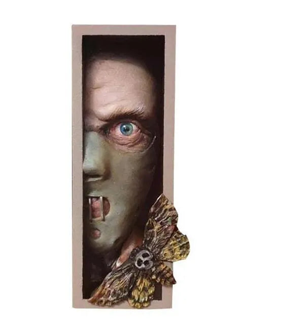 Peeping Monster Bookstand Sculpture